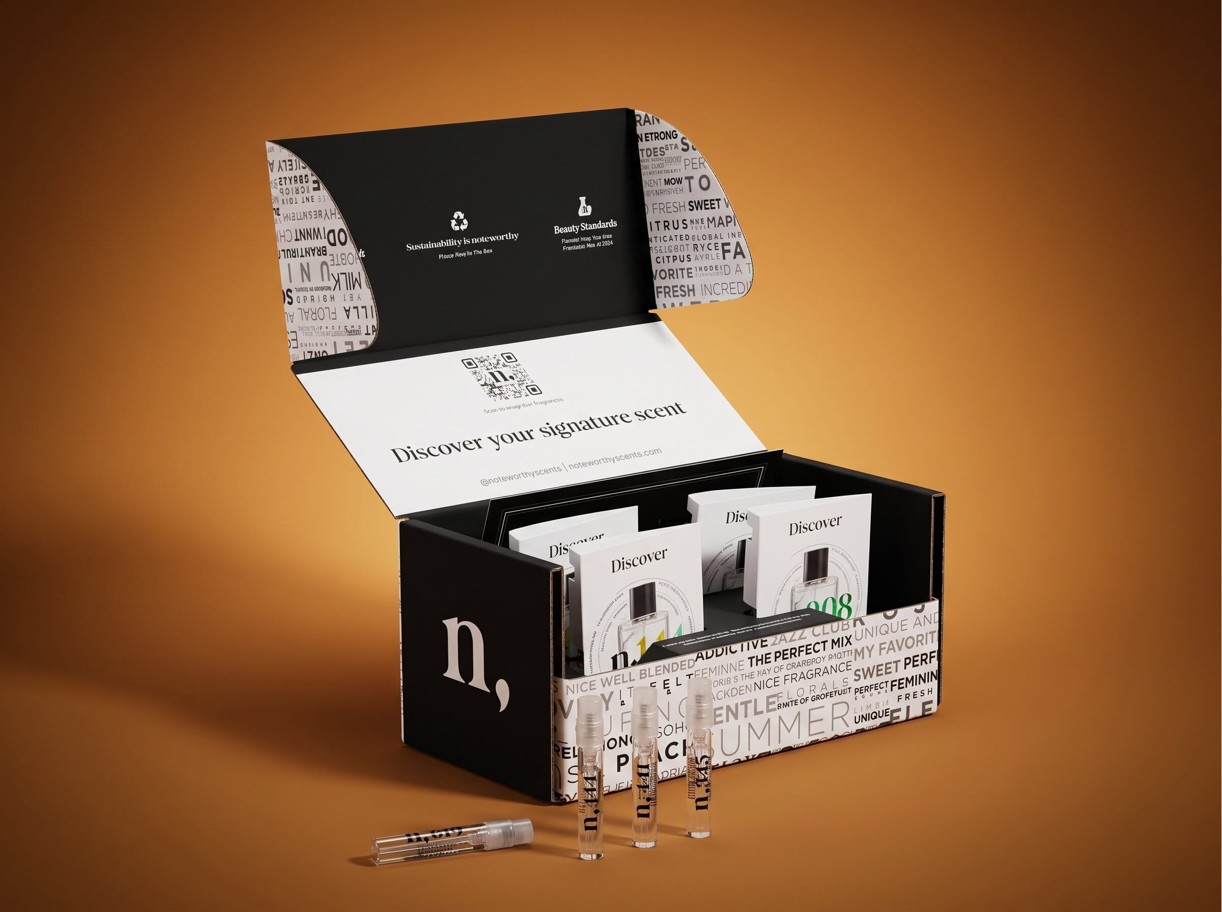 The Noteworthy Discovery Kit — box with sample vials on a warm amber backdrop