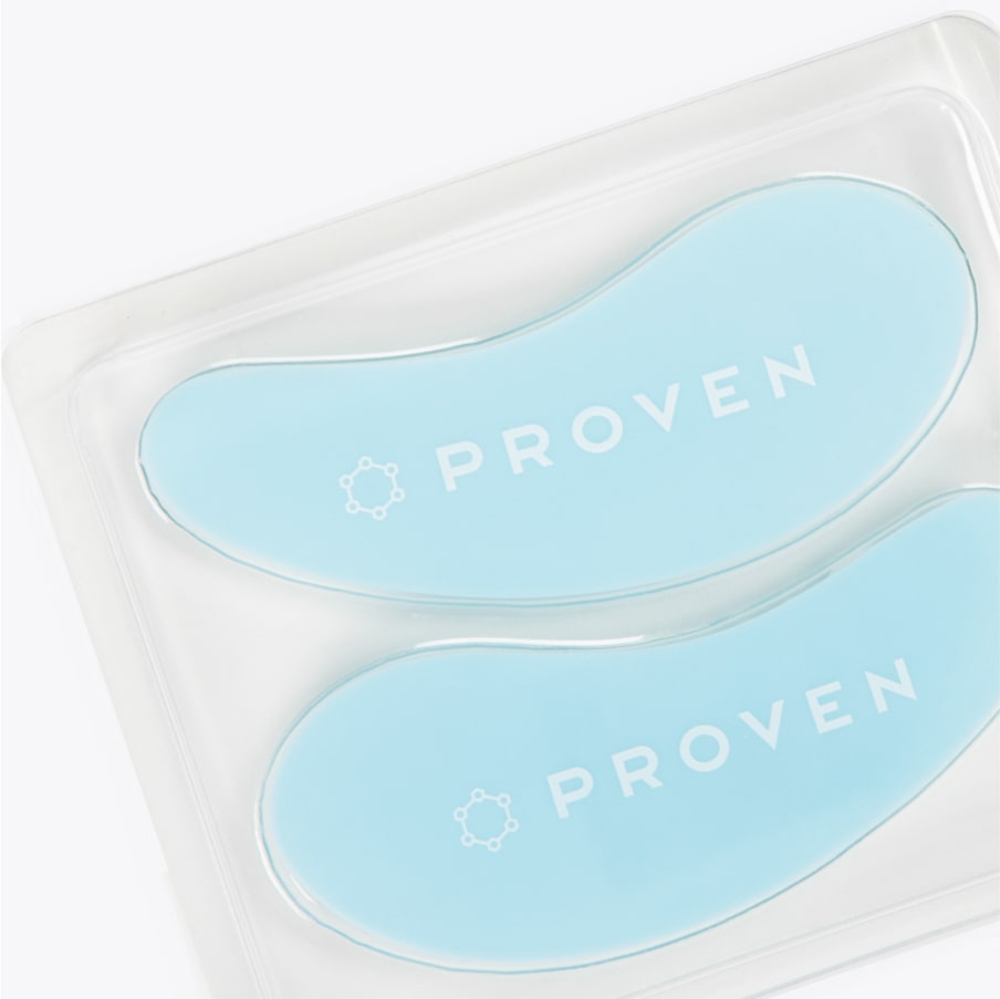 A close-up of the pair of patches in their clear tray, showing the flexible crescent shape.