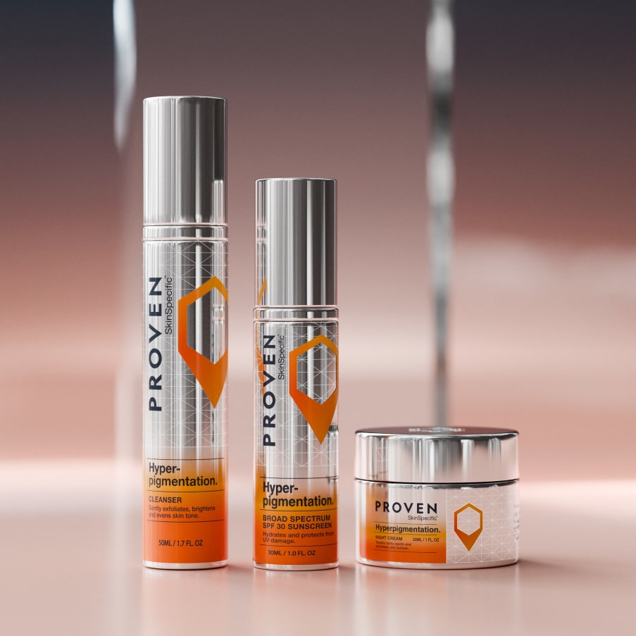 The three SkinSpecific Hyperpigmentation products — cleanser, sunscreen and night cream — on a pink backdrop