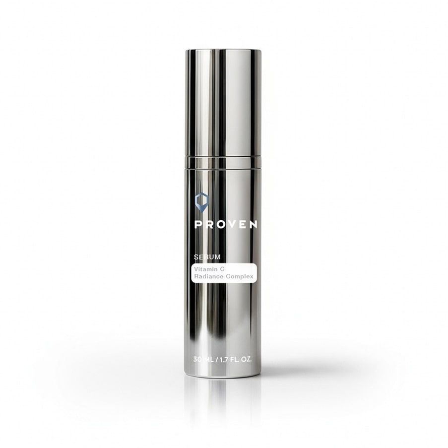The Vitamin C Radiance Complex Serum in its silver 30 ml pump bottle, against a plain white backdrop